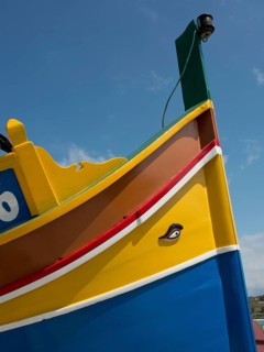 Colourful tip of a boat with one eye pointing to the sky, marsaxlokk, mediterranean sea, malta
