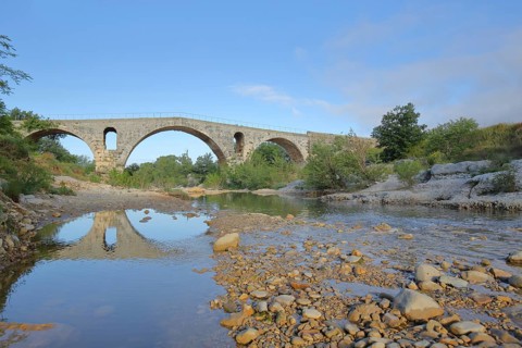 Roman stone arch bridge Pont Julien built 3rd century over the river Calavon, Roman bridge, Roman