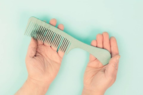 Comb with hair loss, health problem, issue of aging, alopecia areata by stress or infection,