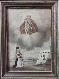 Votive pictures, votive tablets on the walls of the chapel of grace inside the church, pilgrimage