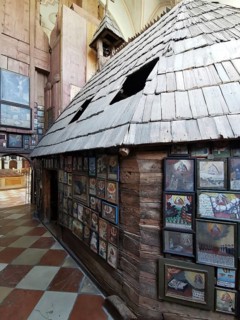 Votive pictures, votive tablets on the walls of the chapel of grace inside the church, pilgrimage