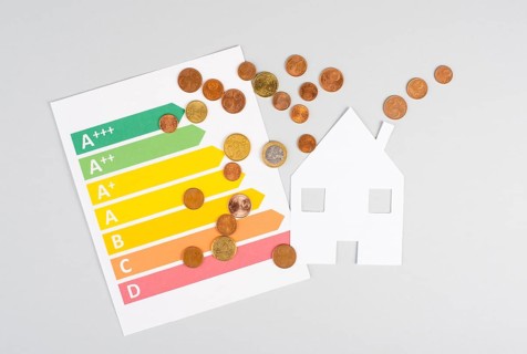 House with power consumption graphic, renewable substainable energy, solar electrcity, green co2
