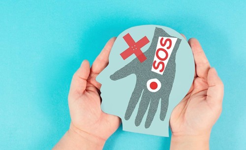 Domestic violence, hand hits face, sos on exclamation mark, international awareness month october