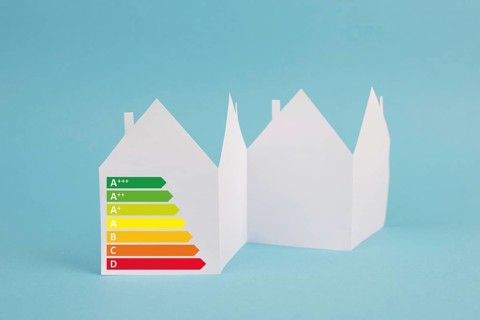 House with power consumption graphic, renewable substainable energy, solar electrcity, green co2