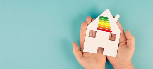 House with power consumption graphic, renewable substainable energy, solar electrcity, green co2