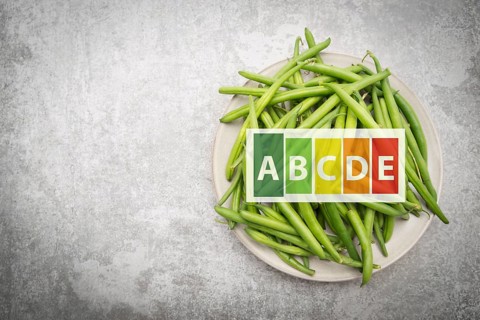 Green fresh string beans on a plate, vegetables, healthy food label, high nutritional values