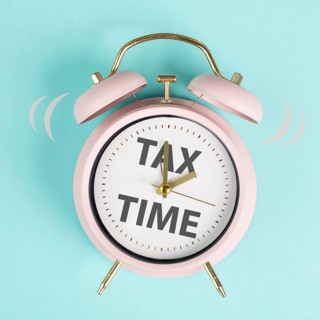 Tax time, alarm clock for taxation, deadline for payment, financial income
