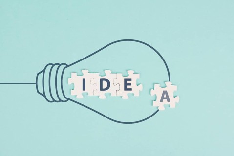 Idea in progress, light bulb, starting a new business, development and growth concept,
