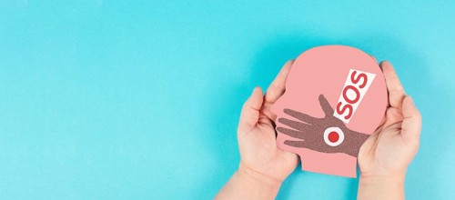 Domestic violence, hand hits face, sos on exclamation mark, international awareness month october