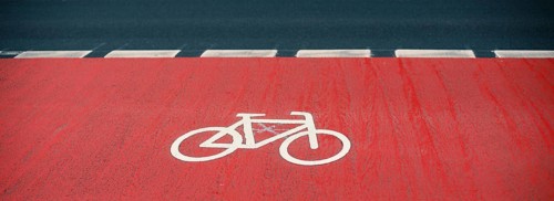 Road with a bicycle path in the city, eco friendly lifestyle, reduce co2 emission footprint