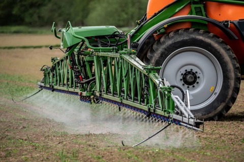 Agriculture, pesticide being sprayed on a field, sugar beet seedlings, North Rhine-Westphalia,