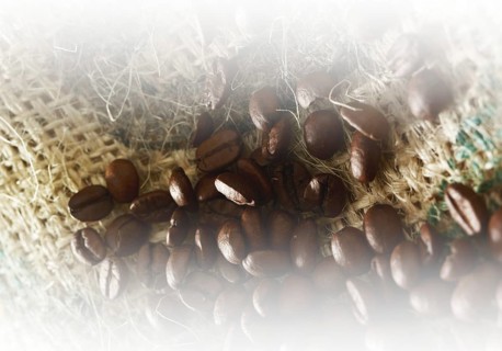Coffee beans on coffee sack, close-up