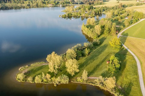 Aerial view of bathing and surfing area at lake Rottachsee, Allgäu, Bavaria, Germany, Europe