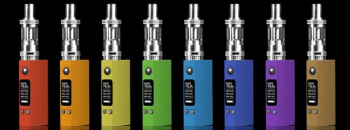 Eight multicolored electronic cigarettes, isolated on black background