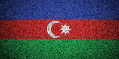 The Azerbaijani flag painted on a cork board