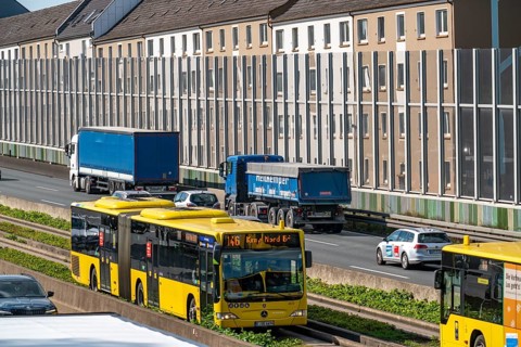 The A40 motorway, Ruhrschnellweg, in Essen, residential buildings directly on the motorway, glass