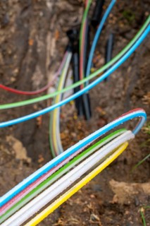 Laying of fibre optic cables, construction site, excavation pit, connection for fast Internet, near