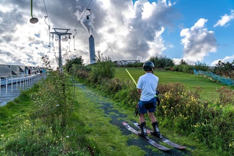 CopenHill, waste incineration plant and artificial ski slope, skiing with a view of the Oresund,