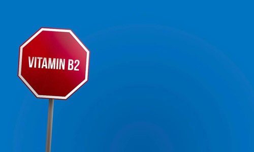 Vitamin B2, red sign with blue sky