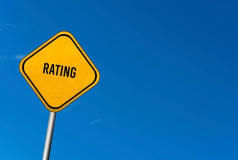 Rating, yellow sign with blue sky