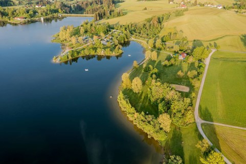 Aerial view of bathing and surfing area at lake Rottachsee, Allgäu, Bavaria, Germany, Europe
