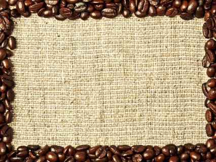 Frame from coffee beans on burlap background
