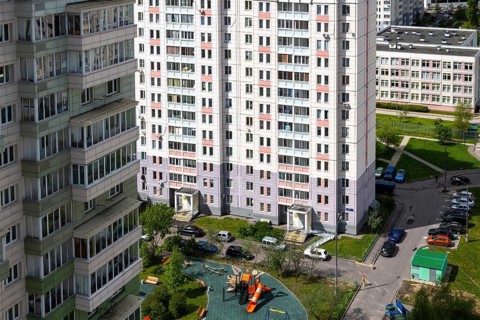 Moscow, Russia, May 29. 2022. Ordinary city yard with cars on a top, Europe