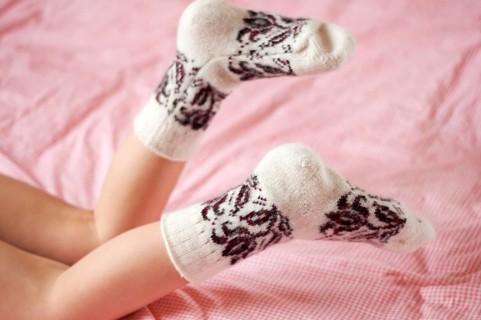 Children's feet in wool socks