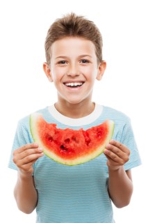 Handsome smiling child boy hand holding red ripe watermelon fruit food slice white isolated