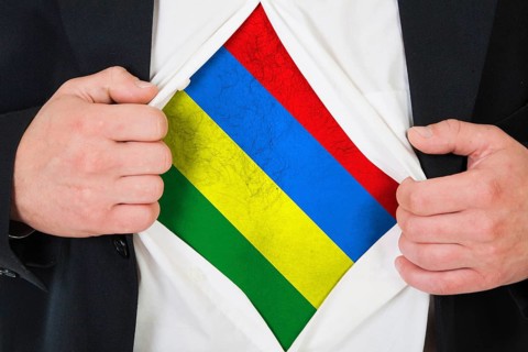 The Mauritius flag painted on the chest of a man