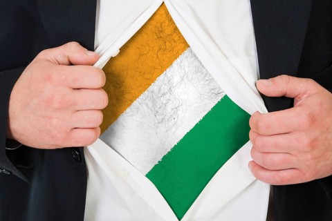 The Republic of Ivory Coast flag painted on the chest of a man