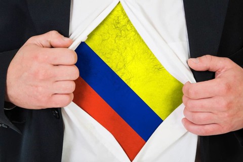 The Colombian flag painted on the chest of a man
