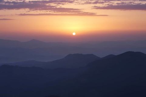 Rising sun under Carpathian mountains, Ukraine, Europe