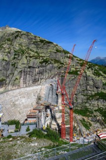 View of construction site of new dam for enlargement of reservoir Grimselsee replacement dam