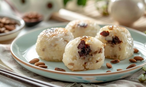 Chinese sweet rice cakes with red bean on a pastel green plate AI generated