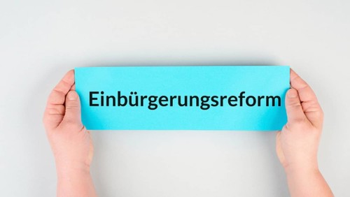 Naturalization reform is standing in german language on the paper, new law in Germany for