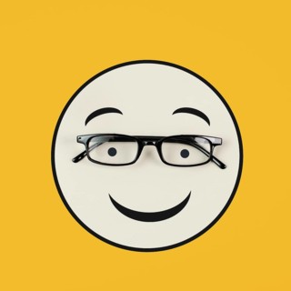 Head with a happy face and eyeglasses, mental health concept, positive mindset, support and