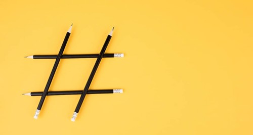 Hashtag made from pencils, social media communication, influencer and followers, viral content