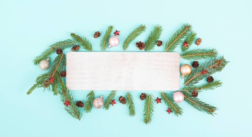Christmas holiday background, frame with fir branches, baubles and cones, winter season greeting
