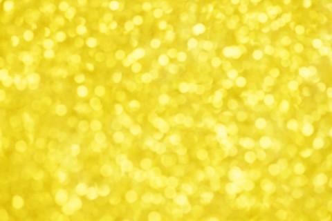 Golden bokeh background for christmas, defocused round lights and sunbeams, flare overlay