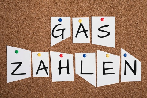 Paying for gas is standing in german language on the bulletin board, increase energy costs,