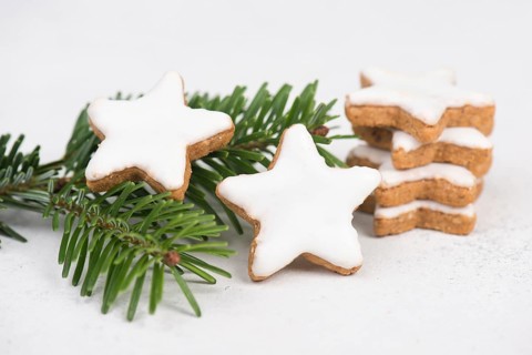 Cinnamon stars, traditional german christmas sweets, gingerbread coated with white sugar, winter