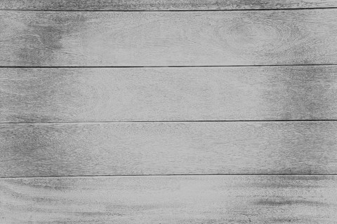 Horizontal grey wooden planks with visible grain and texture, background image