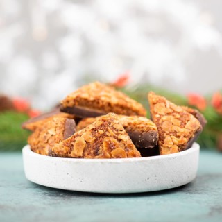 Nut corner triangles, traditional german sweets called Nussecke, covered with chocolate, christmas