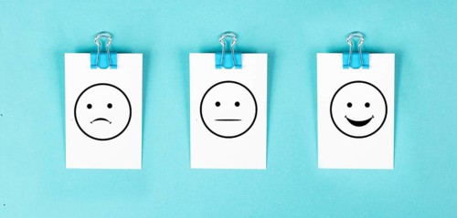 Head with a sad and a happy face, mental health concept, positive and negative mindset, depression,