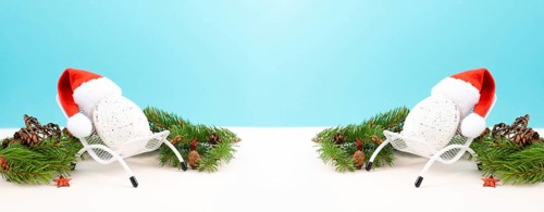 Santa Claus with a red hat sitting in a lounge chair, holiday by the sea, taking a vacation,