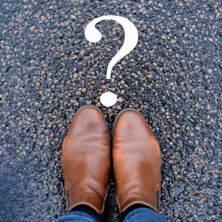 Woman is thinking, question mark on the road, brainstorming and looking for answers, solving a