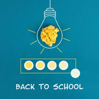 Lightbulb with crumpled paper and a loading bar, the phrase back to school is standing below,