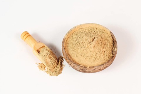 Healing earth powder in a bowl, supplement and antioxidant for to detox the body, alternative