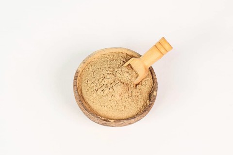 Healing earth powder in a bowl, supplement and antioxidant for to detox the body, alternative